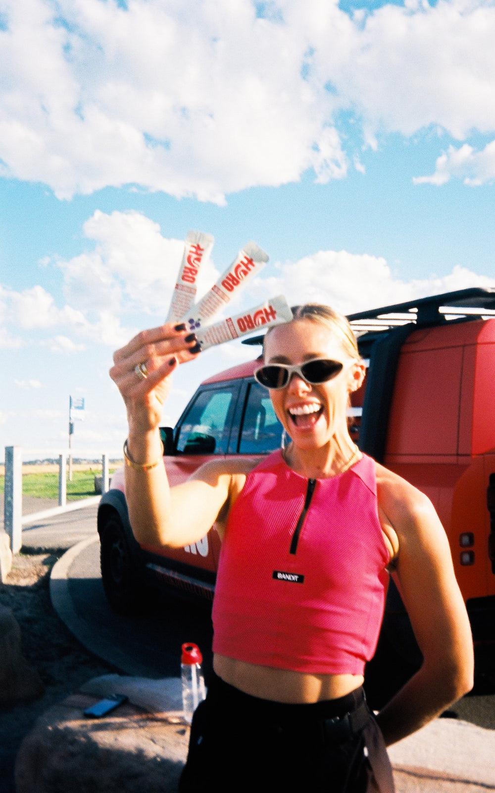 Sarah's Day holding Blackcurrant Crush sticks