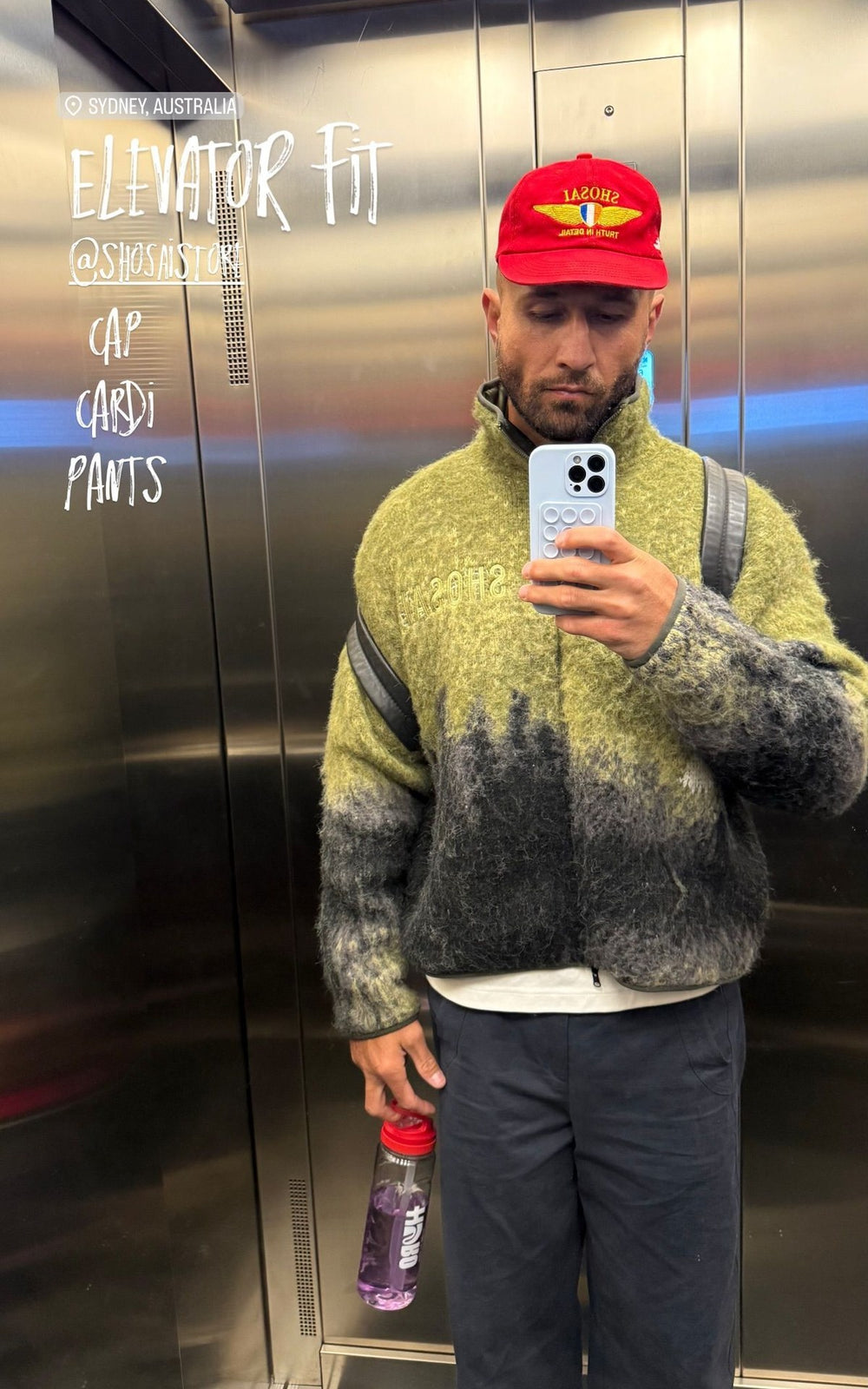 Quade Cooper with a Hyro Blackcurrant bottle
