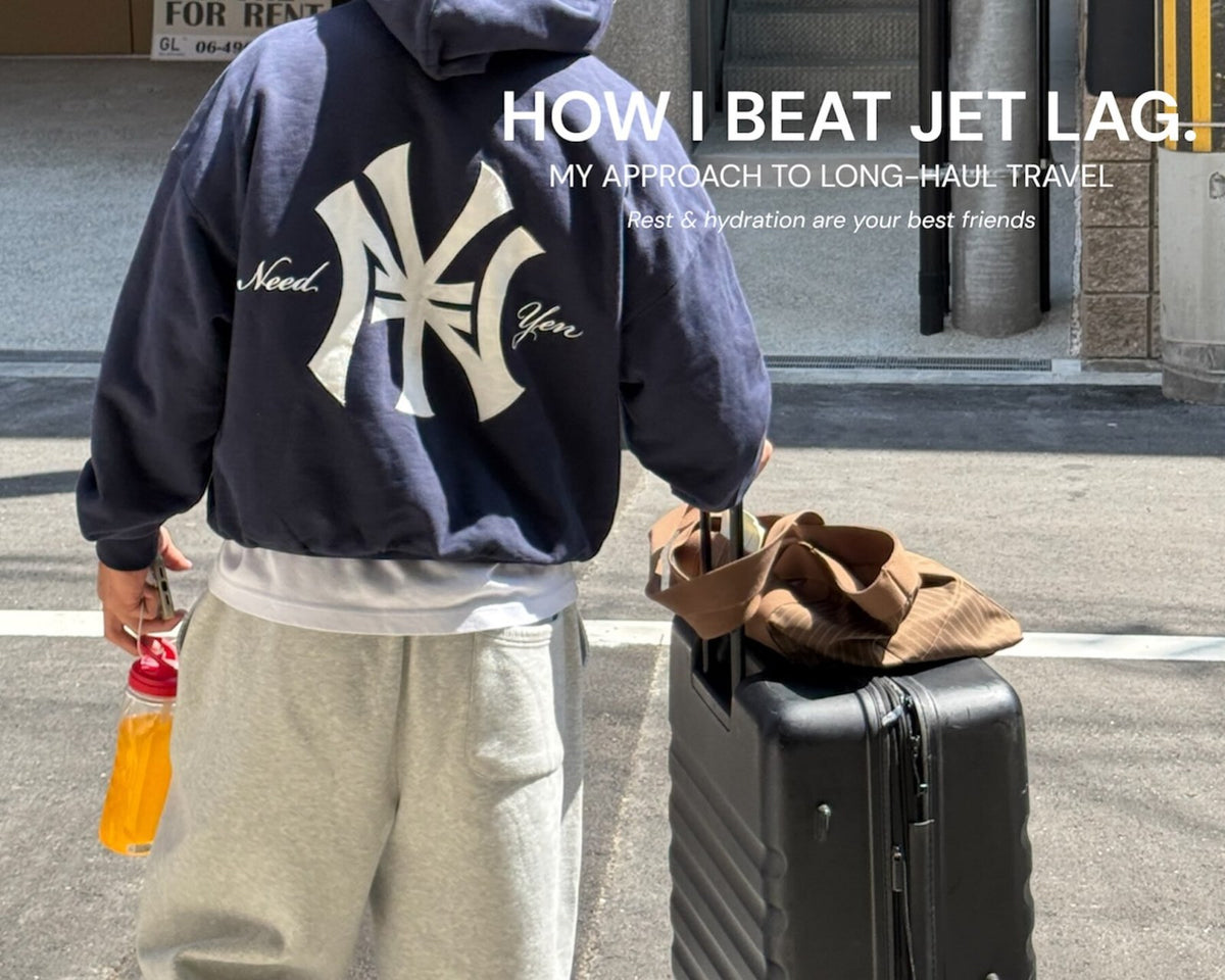 Quade Cooper with a suitcase and a Hyro bottle in Japan