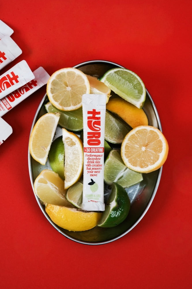 Hyro Lemon & Lime Electrolytes + Creatine stick on fresh lemon and lime